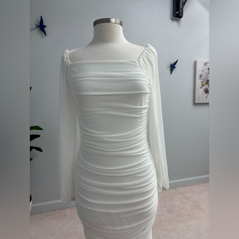White skin tight long sleeve dress